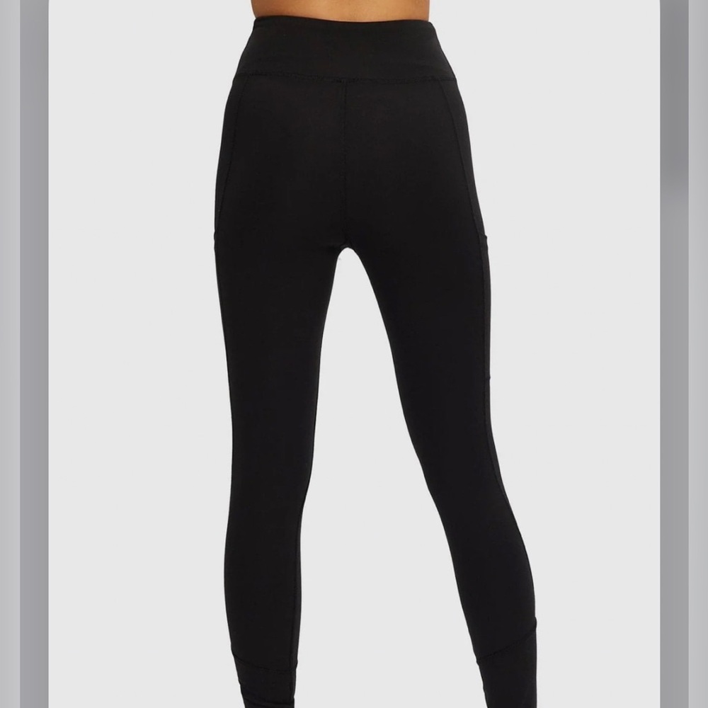 kuwalla ribbed flare with slit m/L
Fits like a medium 
Flare leg with slit